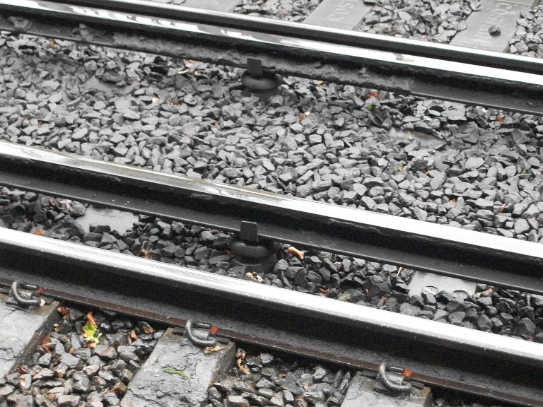 Third rail insulator pots at Woking, Surrey, UK. By Daniel Wright [CC BY-NC-ND 2.0]