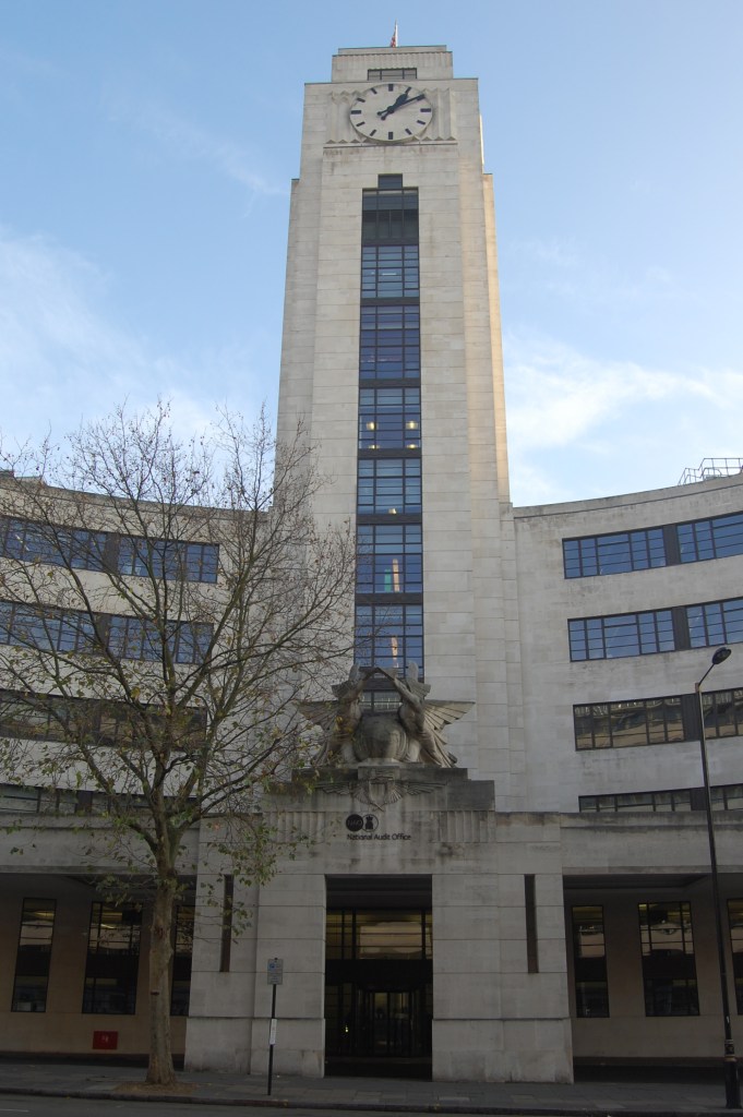 The National Audit Office building, previously the Empire Terminal, London. The central clock tower. By Daniel Wright [CC BY-NC-ND 2.0] via this flickr page