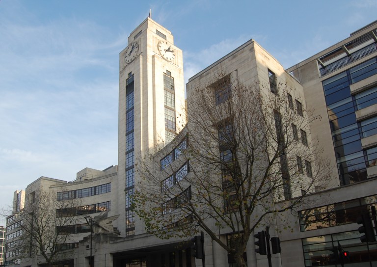 The National Audit Office building, previously the Empire Terminal, London. The later additional wings can be seen running out from behind the original building. By Daniel Wright [CC BY-NC-ND 2.0] via this flickr page