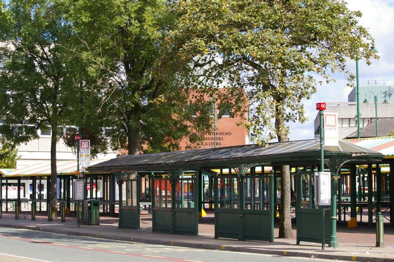 The tram, and now bus, shelter on Market Street, Hyde. By Serigrapher [CC BY-SA 2.0] via this flickr page