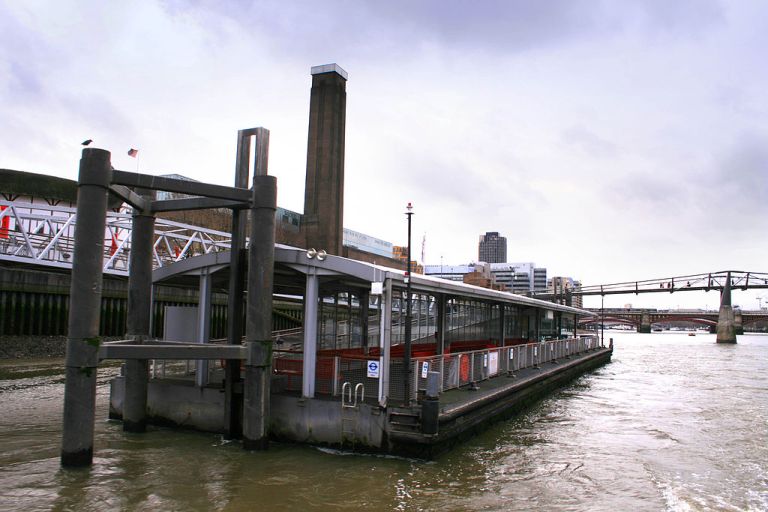 Bankside Pier, April 2008. A less elegant solution has been employed to keep the pier in place. Photo by Cnbrb (Own work) [Public domain], via Wikimedia Commons