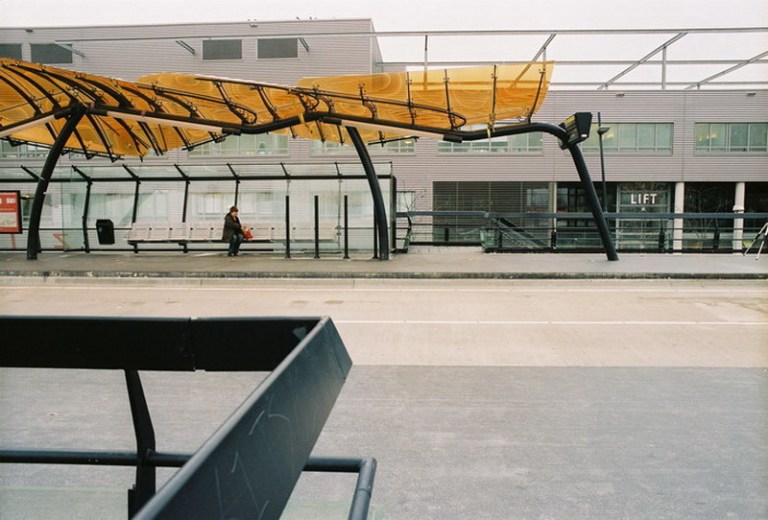 The orange roof of this shelter suggests it is a stop at Spaarne Hospital. By Alena Hanzlová (original print) [CC-BY-SA-3.0], via Wikimedia Commons