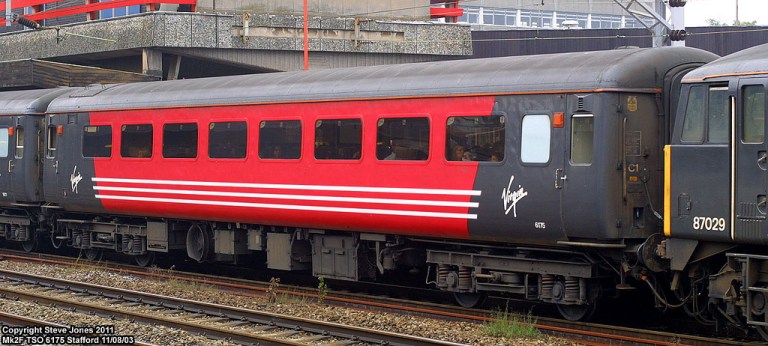 No heraldic motifs here. The Virgin livery was brasher, bolder and more modern than GNER's, with the Virgin brand prominent (no matter the reputational cost). By Steve Jone [CC By 2.0] via this flickr page
