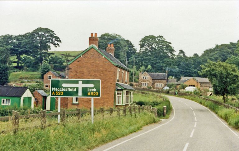 As British as the British countryside. A modern road sign with Transport lettering. Photo by Ben Brooksbank [CC-BY-SA-2.0], via Wikimedia Commons