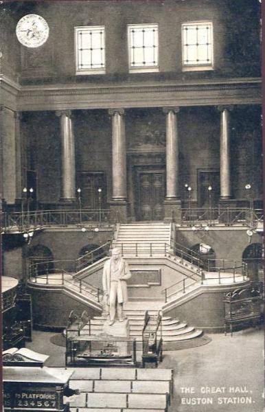 The Great Hall in 1905. Although the structure remained essentially unchanged over its life, photos taken at different times show varying seating layouts or, in this case, display cabinets. By L&NWR (old postcard (reverse)) [Public domain], via Wikimedia Commons