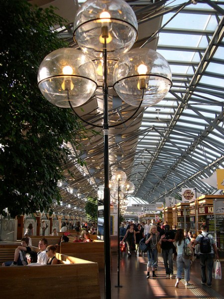 Inside Nils Ericson Terminal, streetlights and trees add to an outside-inside feel. Photo by Daniel Wright [CC BY-NC-ND 2.0] via this flickr album