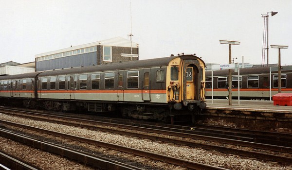 A London & SouthEast-liveried train at Ashford in May 1990. Photo by Paul Wright [CC BY-NC-ND 2.0] via this flickr page