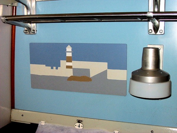 Edward Pond print in a first class compartment. This beach scene is one of his more impressionistic and less detailed works. Photo by Roger Marks [CC BY 2.0] via this flickr page