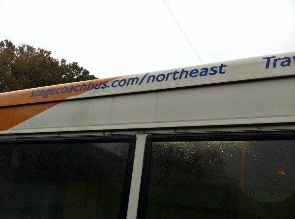 Johnston on the side of a Stagecoach bus in Surrey. Photo by Daniel Wright [CC BY-NC-ND 2.0]
