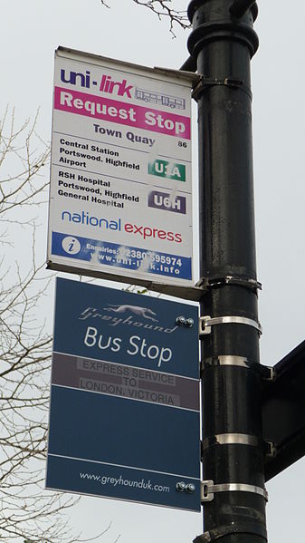 Southampton Town Quay bus stop, where a messy arrangement saw a Greyhound flag attached underneath a local bus services flag. Photo By Arriva436 (Own work) [CC BY-SA 3.0 or GFDL], via Wikimedia Commons