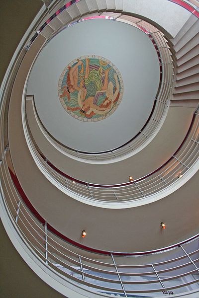 Staircase and Gill ceiling panel. Photo by tom heyes from stockport, uk (Midland Hotel staircaseUploaded by Snowmanradio) [CC BY 2.0], via Wikimedia Commons