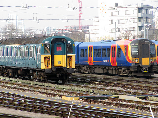 Which is the best train for the modern railway? The one on the right? Not according to some people; they wanted to keep slam-door trains like the one on the left. The slam-door train is a preserved one - this photo was taken in 2014. Photo by Lukes_photos [CC BY-SA 2.0] via this flickr page.