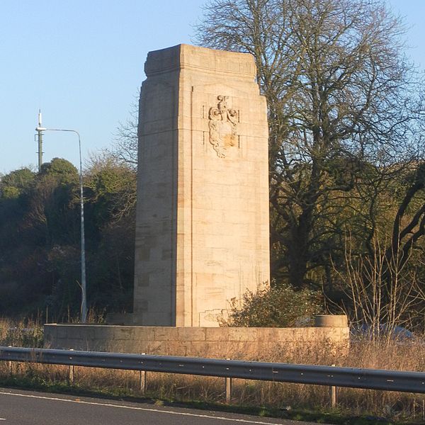 The west pylon and its seat, marooned in the central reservation of the A23. Photo by The Voice of Hassocks (Own work) [Public domain], via Wikimedia Commons